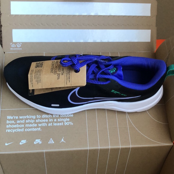 Never worn women’s Nikes. - Picture 2 of 3